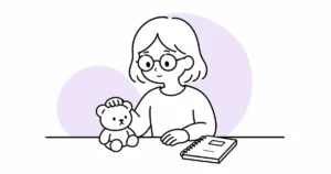 大切にしていたドールを手放す前に見つめる女性の線画